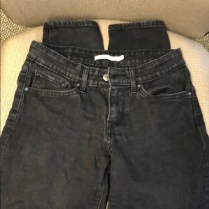 Levi’s 711 skinny, solid black with black label